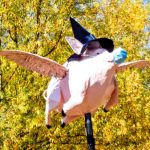 Photo of paper mache pink pig with witch hat