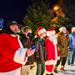 Photo of Students and family members joined the inaugural Douglas County Campus Life Christmas Caroling in the Pines