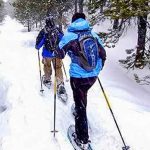 Photo of people snowshoeing