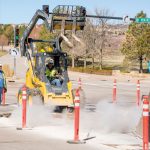 Repairing the persistent potholes that are ever-developing on the road in Castle Pines