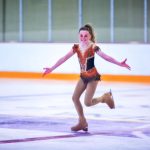 Photo of figure skater Autumn Hall skates at a regional competition