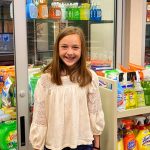 Photo off Fourth grader Madi Petau really enjoyed participating in the school food drive.