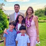 Photo of Drs. Michael and Laura Rosenberg at a wedding in Maui, Hawaii with their children Reese (11), Noah (9) and Cameron (7).