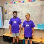 Photo of Thomas D. and Caleb M. standing in BRE classroom.