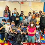 Photo of Castle Pines resident Ric Carrington and STEM School Highlands Ranch fourth grade students